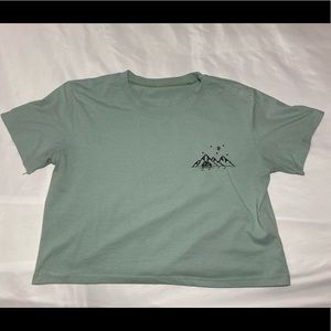light blue/green crop top